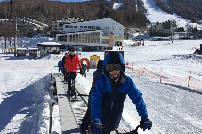 1-Day Snow Monkeys & Snow Fun in Shiga Kogen Tour - Stop 1 at Shiga Kogen: 2 hours of sleds, snow bikes, and snow scooters