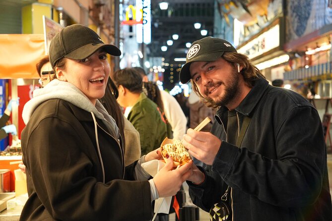 [1 Group Only] Osaka Street Food Tour for Family - Stop 2 in Shinsekai: retro streets, local games, and Osaka lingo