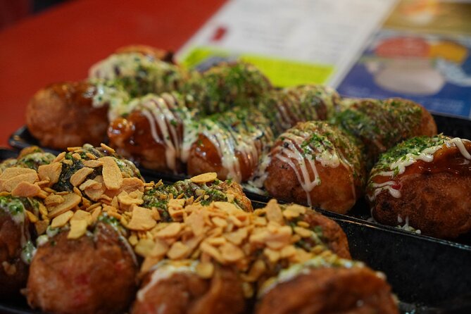 [1 Group Only] Osaka Street Food Tour for Family - Stop 3 in Namba: izakaya time with sashimi, sake, and likely kushikatsu