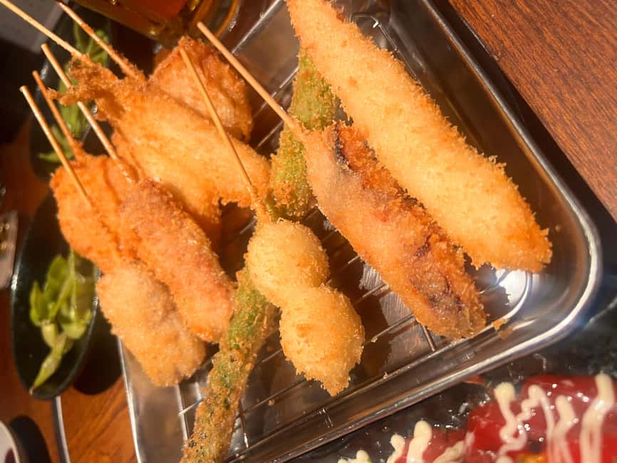 3.5h Osaka Night guided Local Bar Hopping, Sake & Karaoke - Izakaya start: welcome drink and how to not offend anyone
