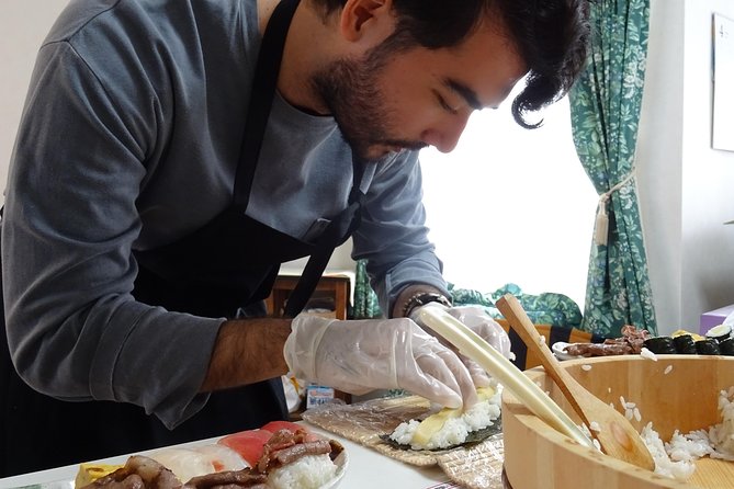 Experience all of Japanese culture and Japanese food experience classes "origami, udon, Japanese food, green tea, calligraphy" in 4 hours - Sushi and gyoza for lunch, plus tempura and small plates