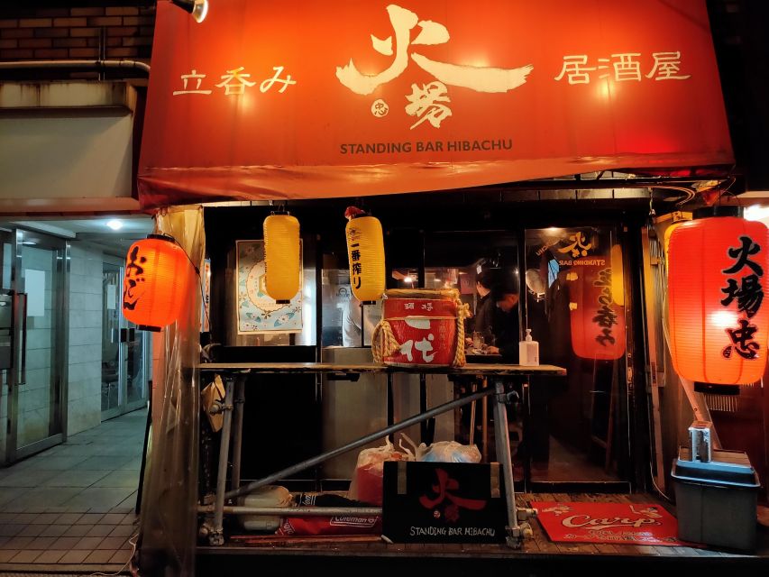 Hiroshima: Food and Culture Guided Walking Tour with Dinner - Nagarekawa Dori at night: shopping, entertainment, and a steady walking rhythm