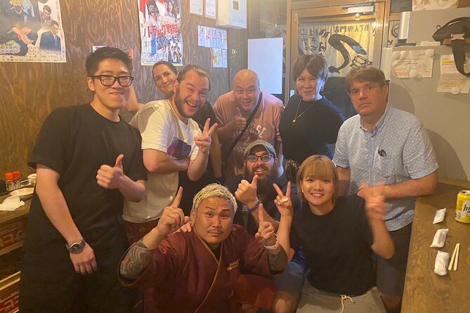 Hungry Osaka Street Food Tour:15 Tastings & 3 Drinks with a Local - Stop 1 in Shinsekai: Tsutenkaku and the Meaning of Kushikatsu