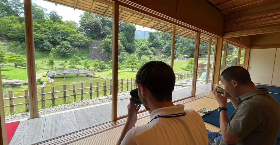 Kanazawa: Samurai, Matcha, Gardens and Geisha Full-Day Tour - Oyama Shrine: a stained-glass fusion with a bridge and koi pond
