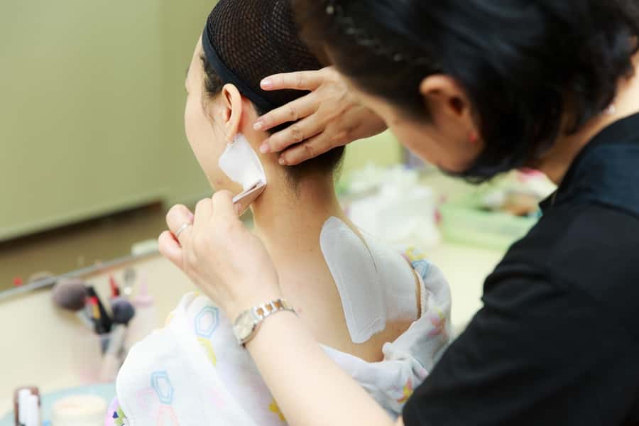 Kyoto: 2-Hour Maiko Makeover and Photo Studio Shoot - The maiko makeup process: two-stripe neck and symbolic eye details