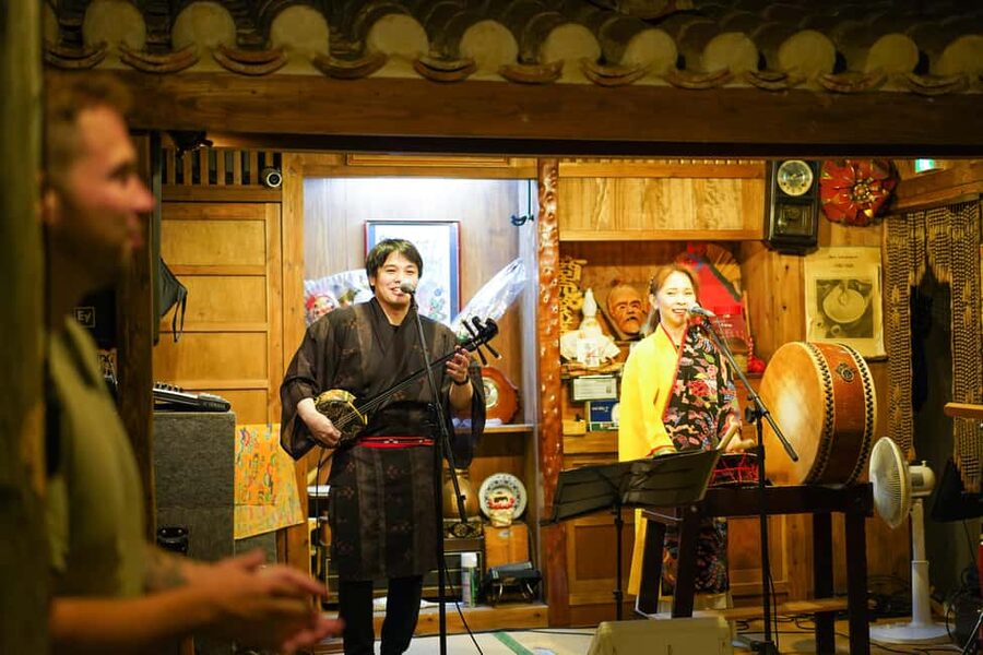 Naha Bar Hopping Tour in Okinawa - Stop 1: Okinawa beer, local comfort foods, and the Habu-shu challenge