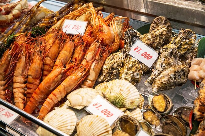 Osaka: 2-Hour Nightlife District Walking & Local Food Culture - First Stop: Dotonbori Glico Sign And the Night-Snack Kickoff