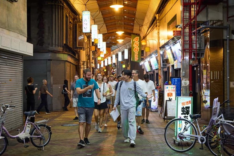 Osaka: Dark Side of Osaka Night Walking Tour - Jyanjyan Yokocho by Tsutenkaku: retro alley energy in tight spaces