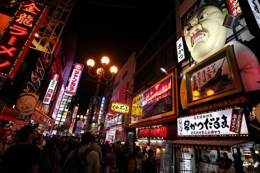 Osaka: Local Foodie Tour in Dotonbori and Shinsekai - Dotonbori okonomiyaki: the table cooking that makes it memorable