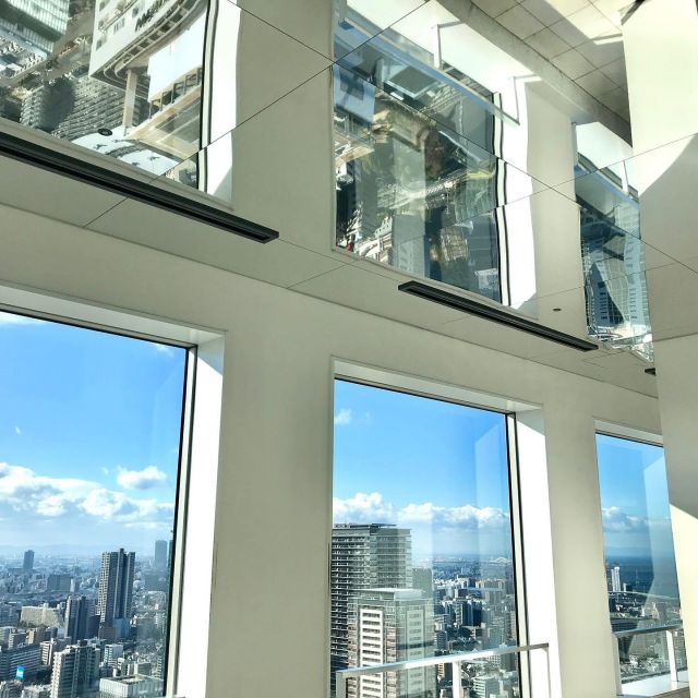 Osaka: Umeda Sky Building Official E-Ticket - How the visit flows: elevators, tower crossing, and the sky-level feel