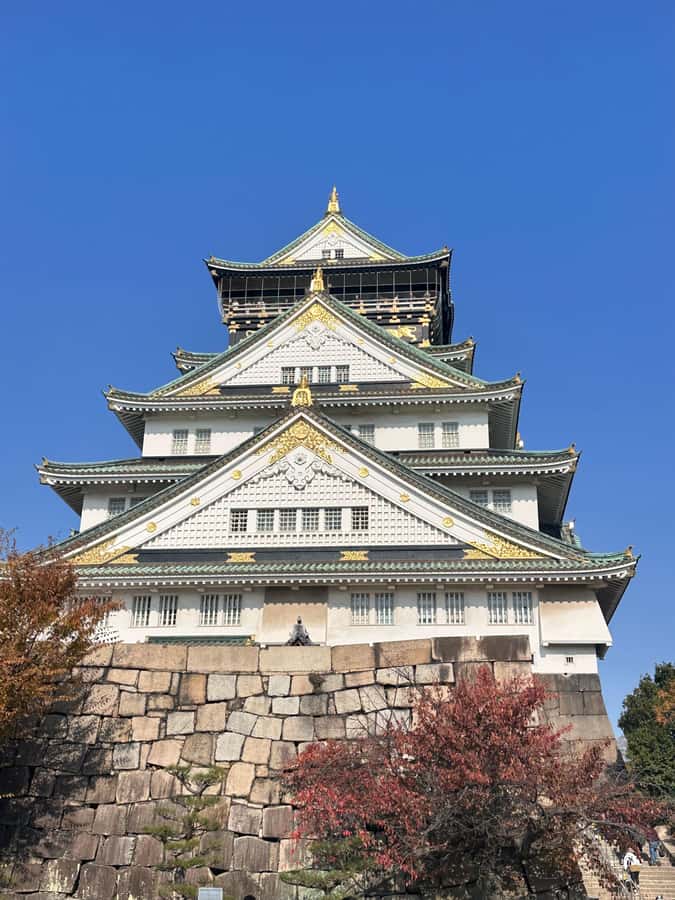 Osaka: Visit the must-see places. - Shinsekai and Tsutenkaku Tower, retro street energy on purpose