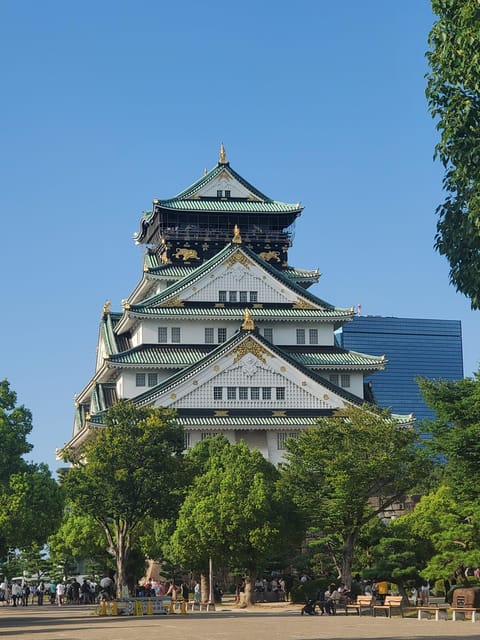 Osaka: Walking Tour and Top Highlights - Osaka Castle Grounds and Hokoku Shrine Photo Stop
