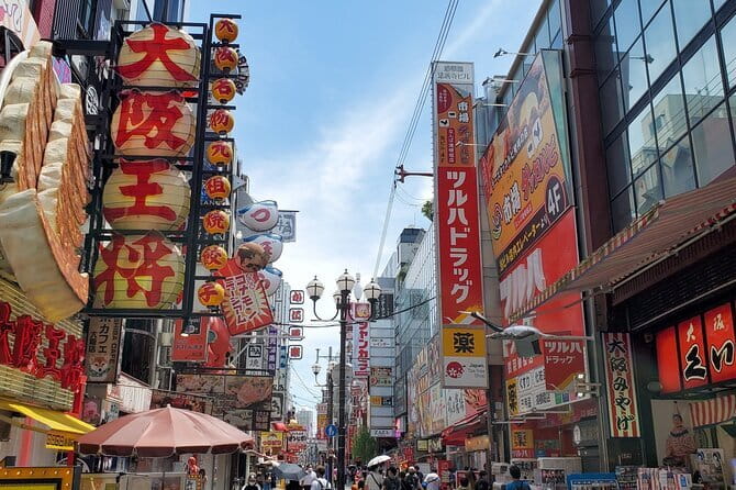 Osaka: Walking Tour to Local Gems, Food & Culture - Price and value: $25 for 150 minutes of guided Osaka