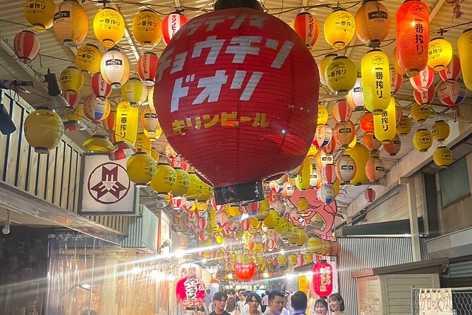Private Osaka Tour with Hotel Meet Up - Dotonbori: neon streets, big signs, and canal-side atmosphere
