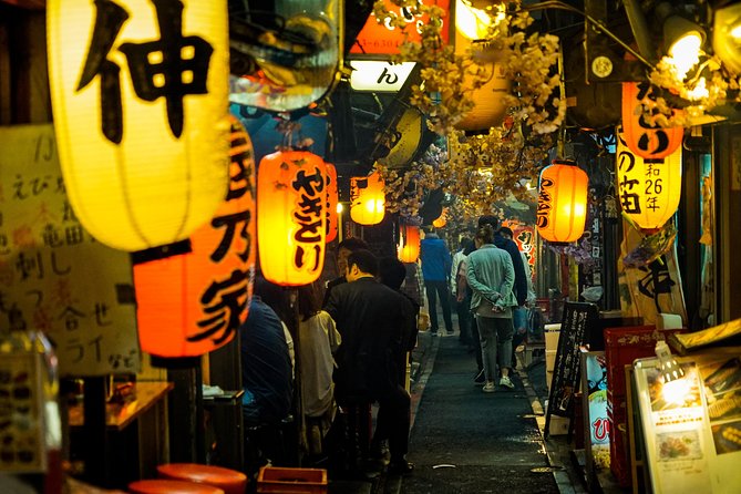 Tokyo Bar Hopping Tour in Shinjuku (All-You-Can-Drink + Dinner) - Godzilla Head Landmarks and the Switch to Golden Gai Mood