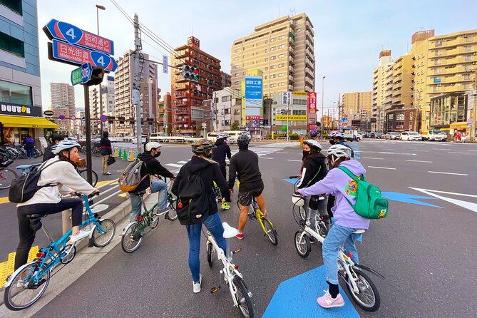 Tokyo downtown bicycle tour Tokyo Backstreets Bike Tour - Meeting point and bike setup, including folding bikes and helmets