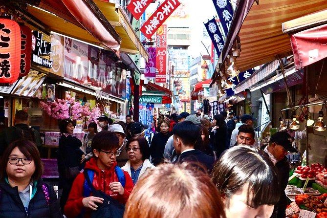 Tokyo: Food Tour in Ueno with 10+ Tastings of Japanese Classics - Buddhist Worship Center Grounds and a Calmer Mid-Tour Shift