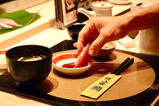 Tokyo: Food Tour in Ueno with 10+ Tastings of Japanese Classics - The Start Around Ueno Station and the Market-Stop Energy