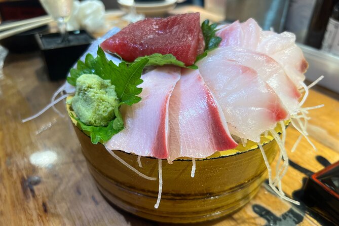 Tokyo: Shinjuku Food Tour (13 Dishes at 4 Local Eateries) - Kabukicho: entertainment district walks plus a traditional meal stop