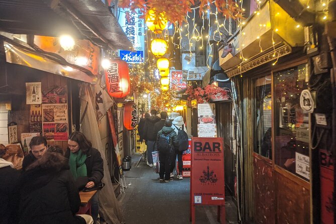 Tokyo Shinjuku Night Tour with Pachinko Gaming Experience - Kabukicho back alleys: the dark, local side in 30 minutes